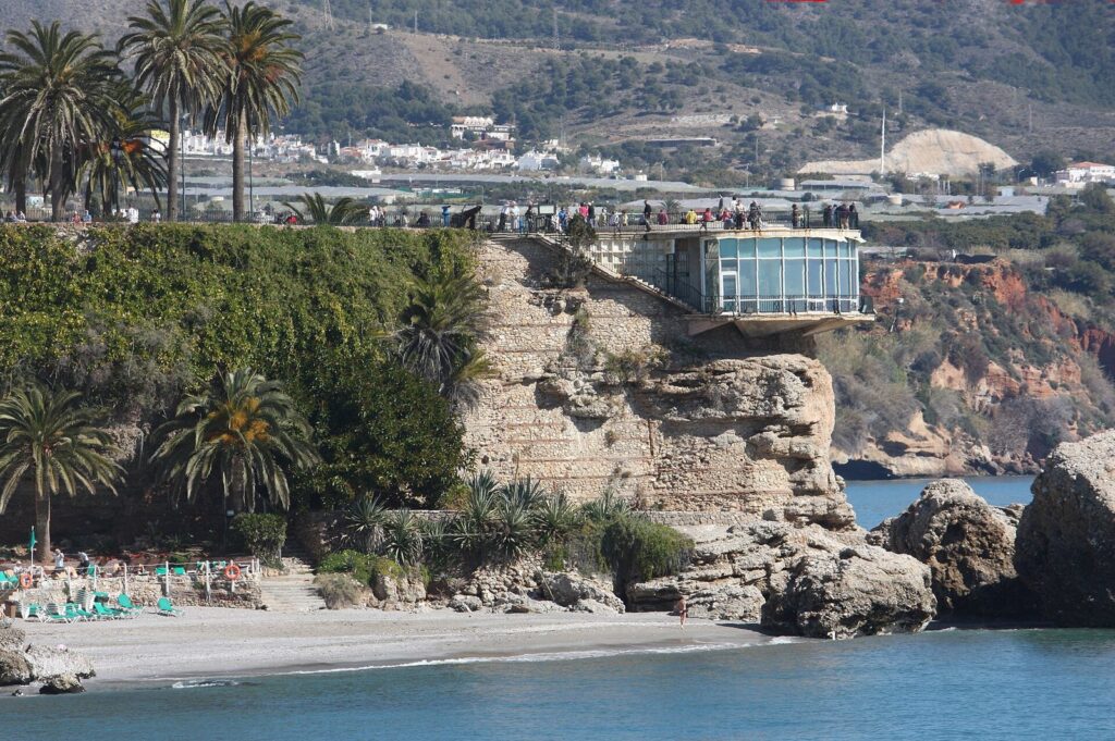 The Balcón de Europa viewpoint in Nerja on its rocky headland above the beach and the Mediterranean